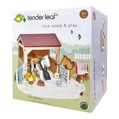 Houten paardenstal met pony’s voor fantasierijk rollenspel.
